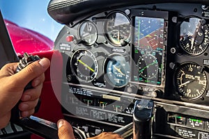 Hands on Stick in Aircraft Cabin During Cruise Flight