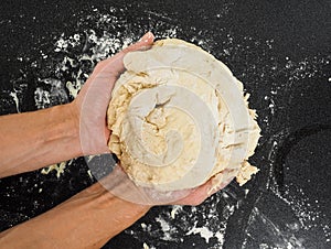 Hands with sticky dough