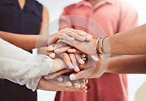 Hands, support and motivation of diversity of friends showing a helping hand and community. People in a group circle