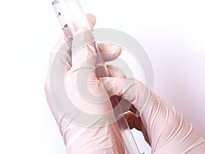 Hands with syringe