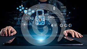 Hands on a Tablet Surrounded by Digital Security Icons Representing Data Protection and Cybersecurity in a Modern