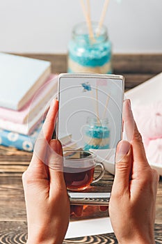 Hands Taking Photo Sweet Marshmallows with Smartphone. Technology Concept