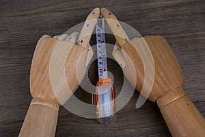 Hands and Tape measure, construction estimating tools