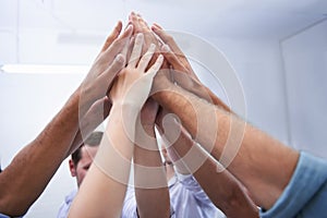 Hands, teamwork and business people high five in office for collaboration, partnership or cooperation. Support, unity