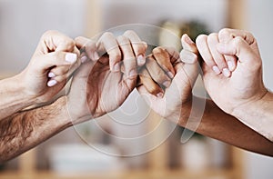 Hands, teamwork and support with a man and woman group holding fingers or thumbs in solidarity. Trust, community and