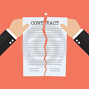 Hands tearing apart contract document paper