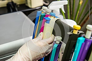 Hands with test tubes close-up. Hands in medical gloves hold tubes. Concept blood test for the presence of a virus. Viral disease