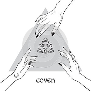 Hands of three witches reaching out to the pagan symbol triquetra. Coven is a gathering of witches.