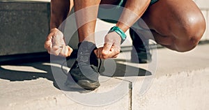 Hands, tie and footwear with a sports person on steps in the city, getting ready for a running workout. Fitness