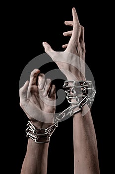 Hands tied chain, kidnapping, dependence, loneliness, social problem, halloween theme, black background