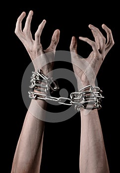 Hands tied chain, kidnapping, dependence, loneliness, social problem, halloween theme, black background