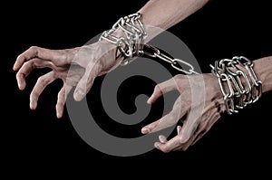 Hands tied chain, kidnapping, dependence, loneliness, social problem, halloween theme, black background