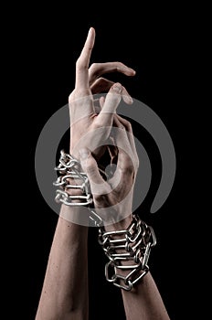 Hands tied chain, kidnapping, dependence, loneliness, social problem, halloween theme, black background