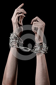 Hands tied chain, kidnapping, dependence, loneliness, social problem, halloween theme, black background