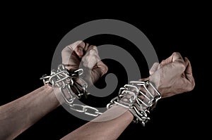 Hands tied chain, kidnapping, dependence, loneliness, social problem, halloween theme, black background