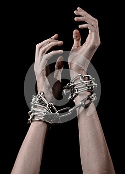 Hands tied chain, kidnapping, dependence, loneliness, social problem, halloween theme, black background