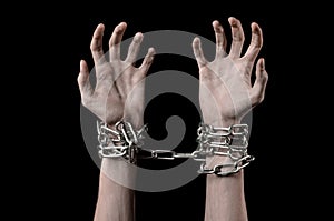 Hands tied chain, kidnapping, dependence, loneliness, social problem, halloween theme, black background photo