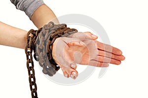 Hands tied with chain, on white