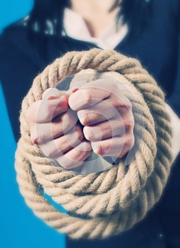 Hands tied with rope