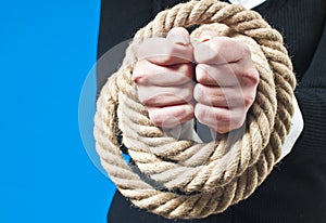 Hands tied with rope