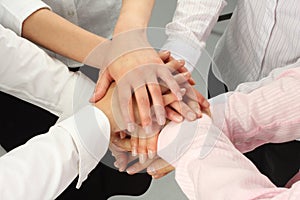 Hands together - dynamic business team