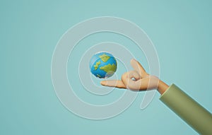 Hands touching earth on blue background