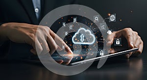 Hands Touching Tablet with Cloud Computing and Data Icons