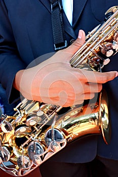 Hands on a trumpet close up.