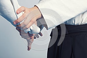 Hands of two girls standing in stance on martial arts training