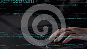 Hands Typing Code on Keyboard with Digital Data Overlay and Programming Language Syntax in a Dark Environment for Tech