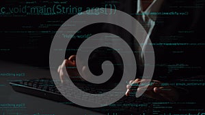 Hands typing on a keyboard with coding text overlay, representing programming, technology, and digital innovation in a