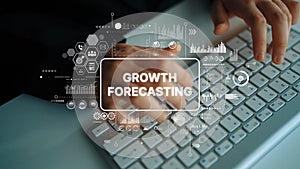 Hands Typing on Keyboard with Data Visualization and Growth Forecasting Concept for Business Analysis and Strategy