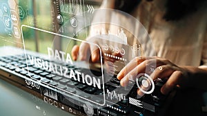 Hands typing on a keyboard with digital graphics and data visualization concept overlay for technology and analytics