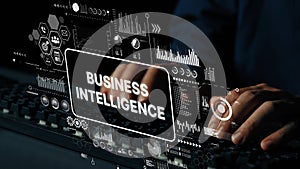 Hands typing on keyboard with digital interface displaying data analytics and business intelligence insights. Asymptotic