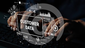 Hands Typing on Keyboard with Digital Interface Showing Customer Data Analysis and Visualization Concepts. Asymptotic