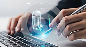 Hands typing on keyboard with glowing digital data stream technology concept