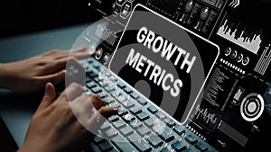 Hands Typing on Keyboard with Growth Metrics Graphical User Interface Elements in Background. Asymptotic smart data