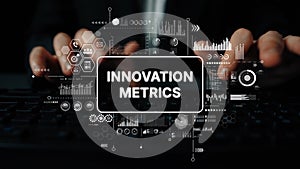 Hands Typing on Keyboard with Overlay of Innovation Metrics and Data Visualization Elements in a Modern Workspace