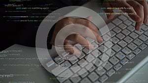 Hands Typing on Keyboard Surrounded by Overlay Code and Programming Elements in Modern Workspace xenic