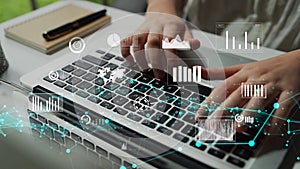 Hands Typing on Laptop with Data Visualization Elements Representing Technology, Analytics, and Business Growth Concepts