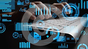 Hands Typing on Laptop with Digital Data Visualization and Graphs Representing Technology, Business Analysis, and