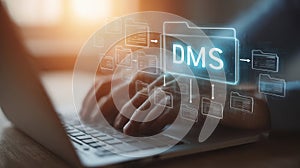 Hands typing on a laptop with digital file system graphic representing document management solutions