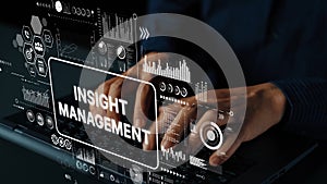 Hands Typing on Laptop with Digital Insight Management Interface and Data Visualization Graphics. Asymptotic smart data