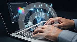 Hands typing on laptop displaying data visualization and network graphs on screen