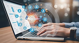 Hands typing on a laptop with glowing digital network connections and data visualization elements