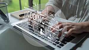 Hands Typing on Laptop Keyboard with Coding and Programming Concepts, Source Code, Data Structure, and Software