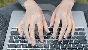 Hands Typing On Laptop Keyboard.Freelancer Internet Online Meeting Webinar.Woman Freelance With Computer Outdoors.Study