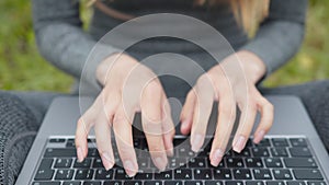 Hands Typing On Laptop Keyboard.Freelancer Internet Online Meeting Webinar.Woman Freelance With Computer Outdoors.Study