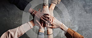 The Hands of Unity Emphasizing Diversity and Collaboration in a Group Setting. AI generated image