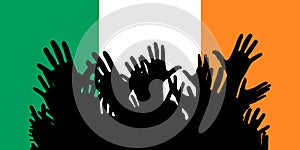 Hands up silhouettes on a Ireland flag. Crowd of fans of soccer, games, cheerful people at a party. Vector banner, card, poster